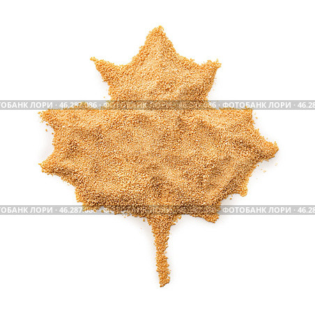 Maple leaf made with granulated sugar on white background. Стоковое фото, фотограф Pixel_shot / Фотобанк Лори