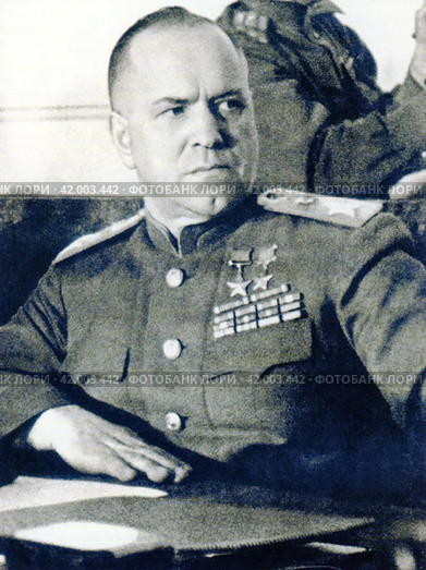 Маршал Советского Союза Георгий Константинович Жуков (1896-1974) во время принятия безоговорочной капитуляции войск нацистской Германии. Карлсхорст, Берлин, 8 мая 1945 года. Редакционное фото, фотограф Сергей Елизарьев / Фотобанк Лори