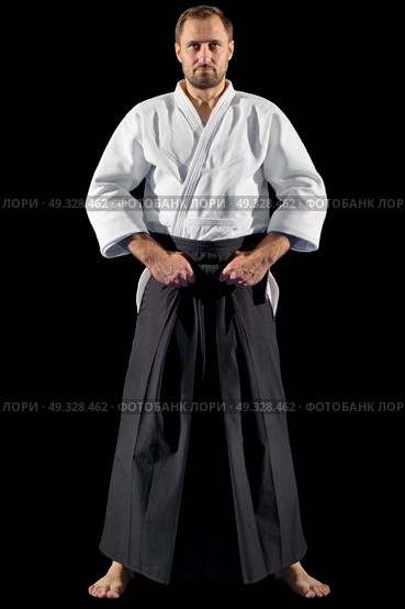Martial arts fighter isolated on black. Стоковое фото, агентство Ingram Publishing / Фотобанк Лори