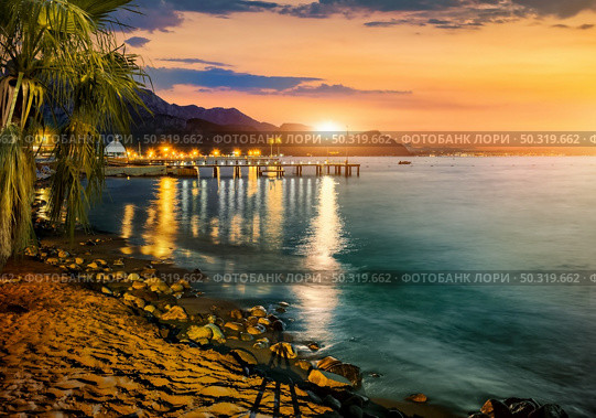 Mediterranean sea and mountains in turkish Kemer. Reflection in the sea. Стоковое фото, агентство Ingram Publishing / Фотобанк Лори