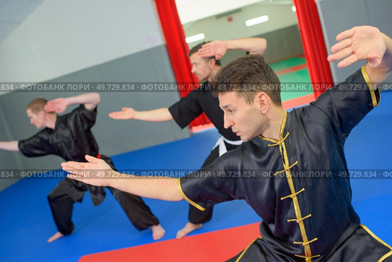 men on martial arts class. Стоковое фото, агентство Ingram Publishing / Фотобанк Лори