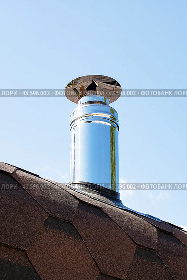 Metal stove pipe on the roof closeup. Стоковое фото, фотограф Аксенова Вера / Фотобанк Лори