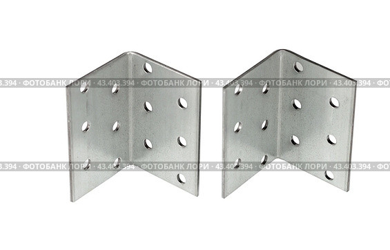 Металлический крепежный угольник на белом фоне. Metallic angle fixator on white background. Стоковое фото, фотограф Татьяна Д / Фотобанк Лори