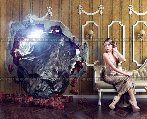 Meteorite enters the room, scaring the woman on the sofa. Photo combination creative concept. Стоковое фото, агентство Ingram Publishing / Фотобанк Лори