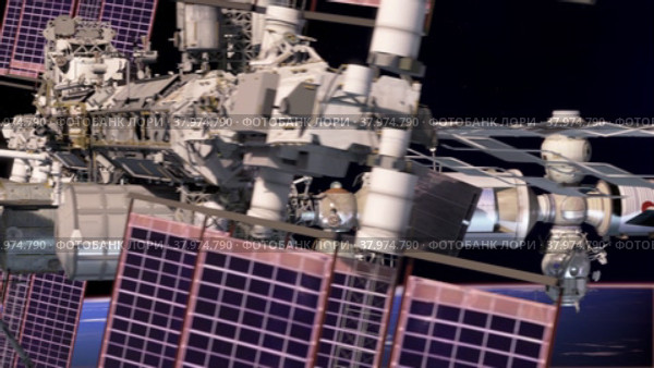 Международная Космическая Станция в космосе на земной орбите. Стоковая анимация, аниматор Max Konnov / Фотобанк Лори