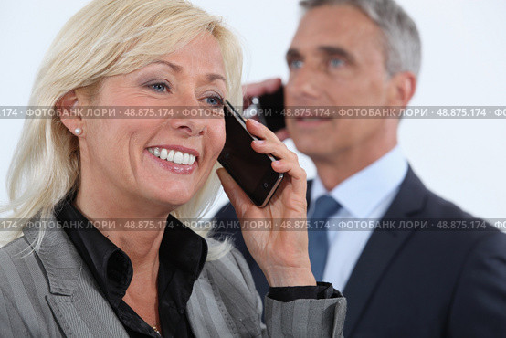 Middle-aged business partners. Стоковое фото, агентство Ingram Publishing / Фотобанк Лори