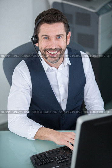 middle aged customer service representative. Стоковое фото, агентство Ingram Publishing / Фотобанк Лори