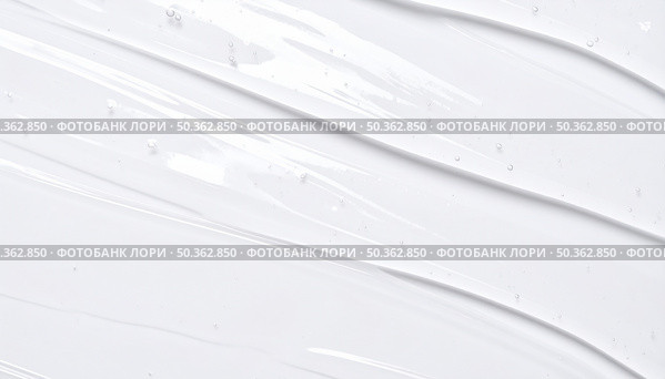 Minimalist texture of white liquid or cream symbolizing beauty product, skincare, wellness or smooth cosmetic formulation. Стоковое AI-изображение, AI-художник Igor Tichonow / Фотобанк Лори