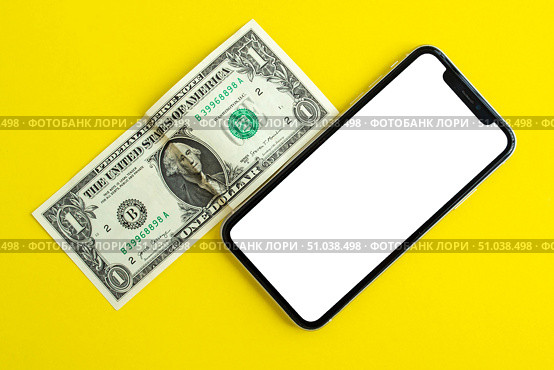 Mockup, smartphone and dollar on yellow background. Стоковое фото, фотограф Юлия Николаева / Фотобанк Лори