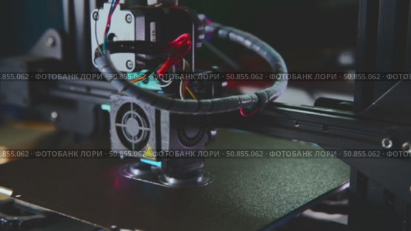 Modern 3d printer creating a rapid prototype in a laboratory, showcasing advanced additive manufacturing technology with precision and innovation. Стоковое видео, видеограф Ольга Ильина / Фотобанк Лори