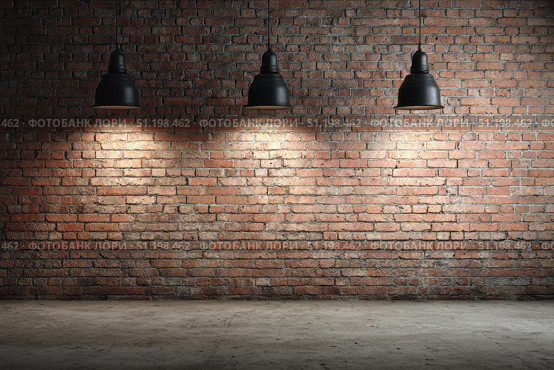 Modern black pendant lights with vintage light bulb hanging among bricks wall. Hanging ceiling light in a white shared office space. Decorative geometric metal lamp. Suspended chandelier loft style. Стоковое фото, фотограф Марина Демидюк / Фотобанк Лори