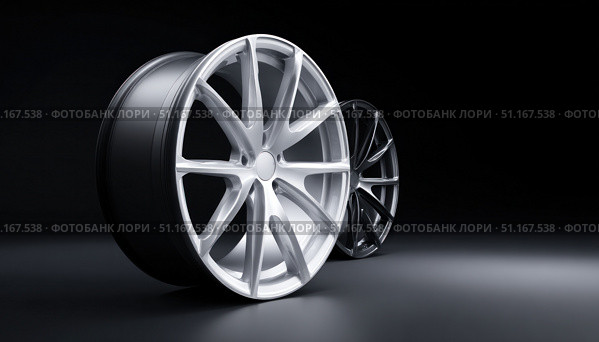 Modern silver and black alloy wheels standing on dark background represent automotive industry, car tuning and customization, showcasing elegance and performance upgrades. Стоковое AI-изображение, AI-художник Юрий Поздников / Фотобанк Лори