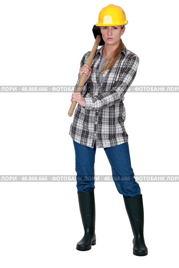 Moody labourer carrying a mallet. Стоковое фото, агентство Ingram Publishing / Фотобанк Лори