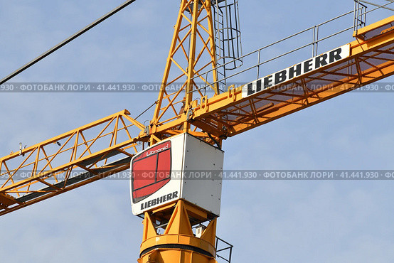 Moscow, Russia - Oct 11.2023. Cabin and part of the liebherr crane boom. Редакционное фото, фотограф Володина Ольга / Фотобанк Лори