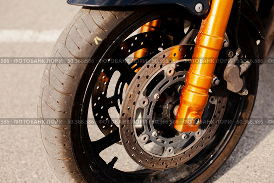 motorbike wheel closeup view. Стоковое фото, агентство Ingram Publishing / Фотобанк Лори