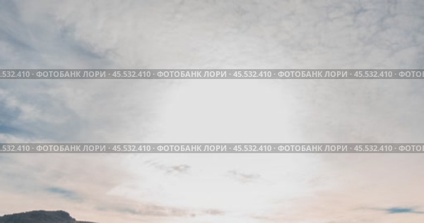 Mountain lake time lapse in summer or autumn. Wild nature and beautiful sunset. Moving clouds, deep twilight and dramatic sky. Стоковое видео, видеограф Александр Маркин / Фотобанк Лори