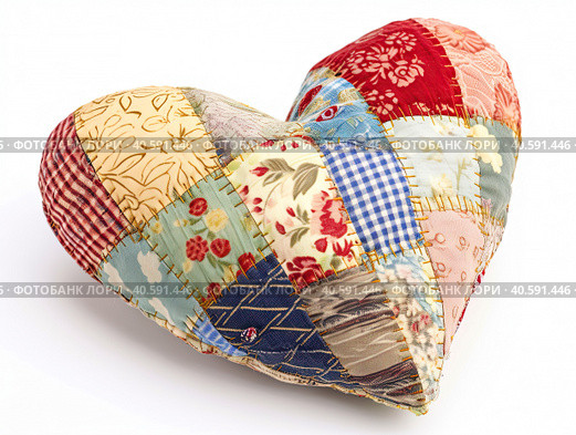 Multicolored pillow made of heart-shaped patches. Created by AI. Стоковое AI-изображение, AI-художник Ярославский Максим / Фотобанк Лори