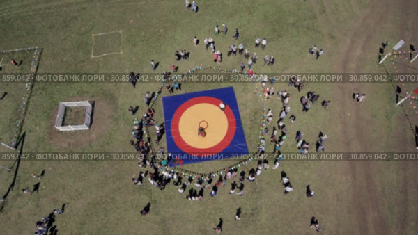 Народные гуляния в Башкирии - сабантуй - праздник плуга. Folk festivals in Bashkiria - Sabantuy - the holiday of the plow. Aerial view. Стоковое видео, видеограф Евгений Романов / Фотобанк Лори