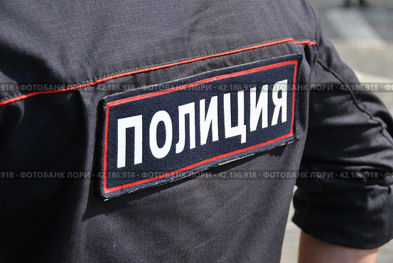 Нашивка на спине "полиция" (2014 год). Редакционное фото, фотограф lana1501 / Фотобанк Лори