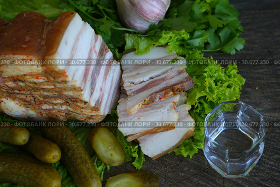 Натюрморт с салом с мясной прослойкой,водкой и солеными огурцами. Стоковое фото, фотограф Марина Володько / Фотобанк Лори