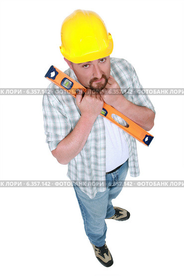Nervous man holding spirit-level. Стоковое фото, фотограф Phovoir Images / Фотобанк Лори
