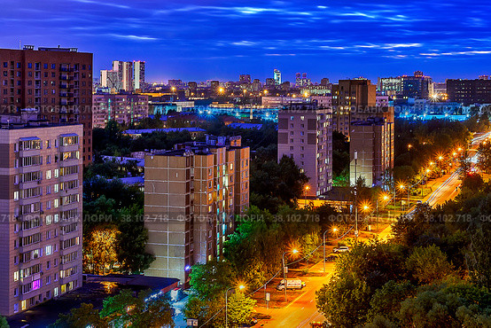 Night street in lights with blue sky and yellow road. Стоковое фото, фотограф Галина Царькова / Фотобанк Лори