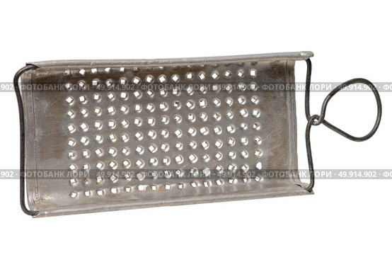 Old metal scraper isolarted on white background. Стоковое фото, агентство Ingram Publishing / Фотобанк Лори