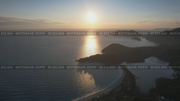 Oludeniz turkey at sunset drone footage. Стоковое видео, видеограф German Zvyagin / Фотобанк Лори