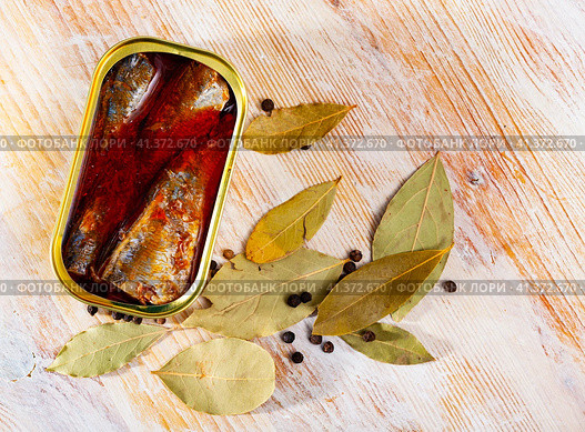 Open tin can of spicy sardines in aluminium can. Стоковое фото, фотограф Яков Филимонов / Фотобанк Лори