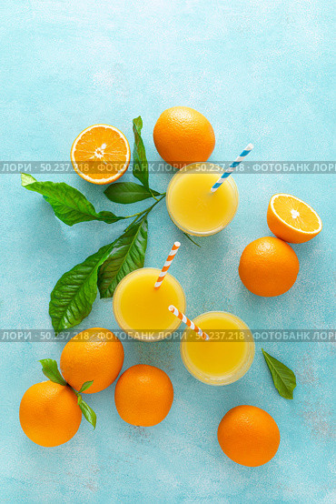 Orange juice, freshly squeezed juice, vitamin C concept. Стоковое фото, агентство Ingram Publishing / Фотобанк Лори