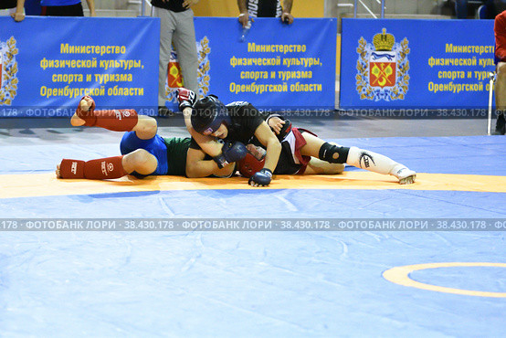 Orenburg, Russia - October 5, 2019: Men compete in Pankration wrestling. Редакционное фото, фотограф Владимир Галкин / Фотобанк Лори