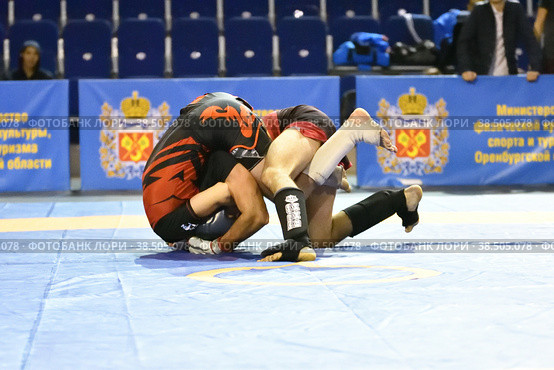 Orenburg, Russia - October 5, 2019: Men compete in Pankration wrestling. Редакционное фото, фотограф Владимир Галкин / Фотобанк Лори