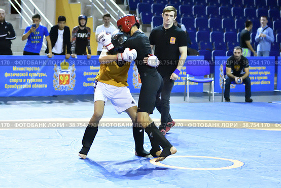 Orenburg, Russia - October 5, 2019: Men compete in Pankration wrestling. Редакционное фото, фотограф Владимир Галкин / Фотобанк Лори