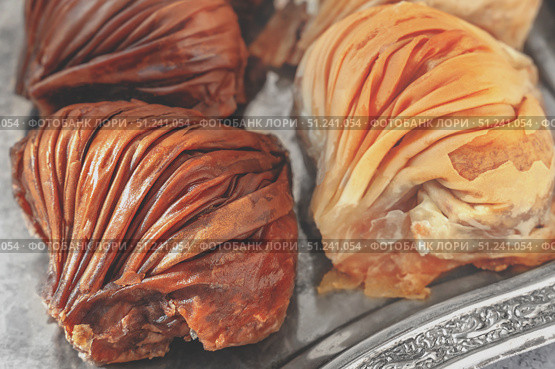 Oriental sweets macro photography. Close-up of baklava of two types of baklava. Стоковое фото, фотограф Оксана Медведева / Фотобанк Лори