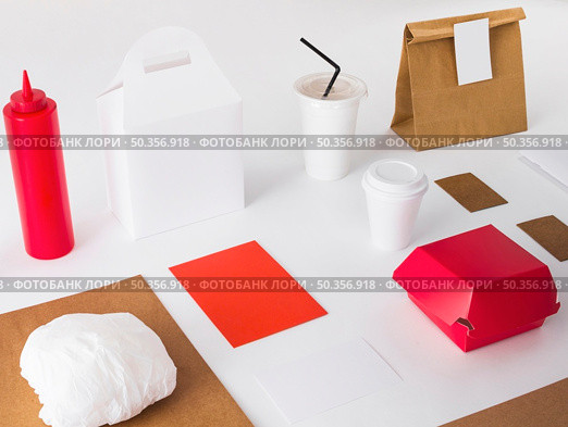 packed food with disposal cup sauce bottle white background. Стоковое фото, агентство Ingram Publishing / Фотобанк Лори