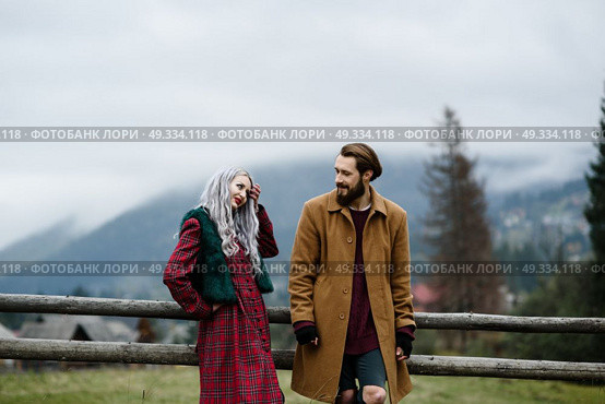 pair of lovers in the Carpathian mountains in national costumes. Стоковое фото, агентство Ingram Publishing / Фотобанк Лори
