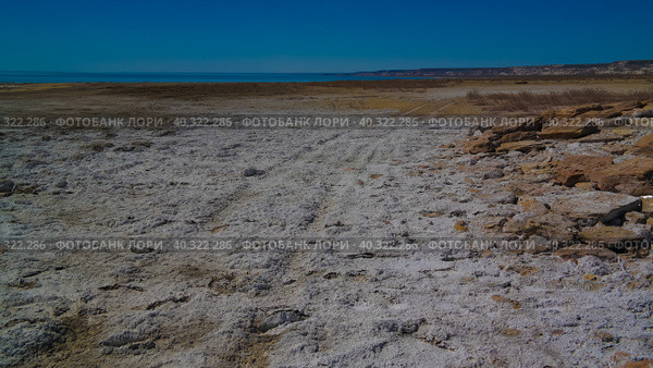 Panorama view to Aral sea from the rim of Plateau Ustyurt near Duana cape in Karakalpakstan, Uzbekistan (2017 год). Стоковое фото, фотограф Сергей Майоров / Фотобанк Лори