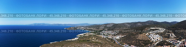 panoramic view of a city with a large body of water in the background. Стоковое фото, фотограф Дмитрий Брусков / Фотобанк Лори