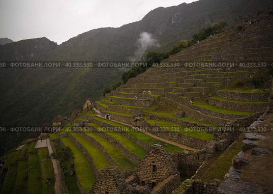 Panoramic view to Machu Picchu archaeological site with Polygonal masonry, Cuzco, Peru (2018 год). Стоковое фото, фотограф Сергей Майоров / Фотобанк Лори