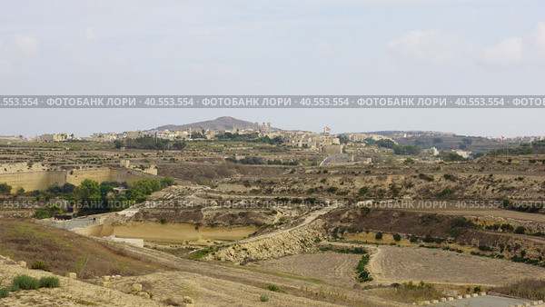 Панорамный вид на город Арб. Гозо. Мальта. (Panoramic view of Gharb city. Gozo. Malta.) (2018 год). Стоковое фото, фотограф Igor Bakirov / Фотобанк Лори