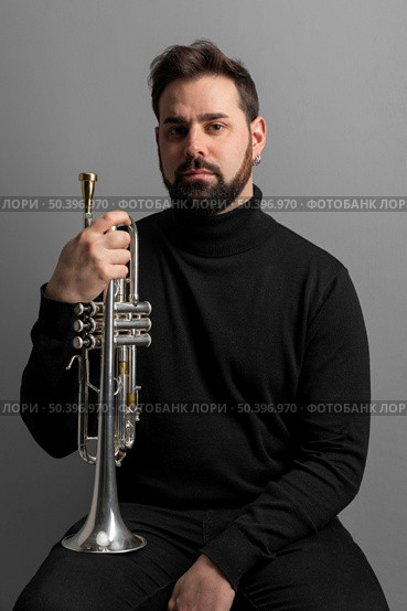 passionate musician celebrating jazz day event 12. Стоковое фото, агентство Ingram Publishing / Фотобанк Лори