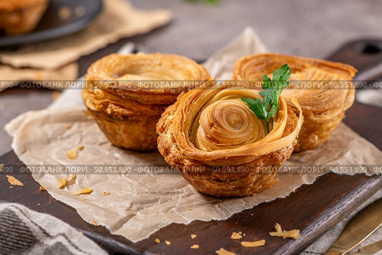 Pastries filled with meat, traditionally baked in black clay molds both from the region on Vila Real, Portugal. Стоковое фото, агентство Ingram Publishing / Фотобанк Лори