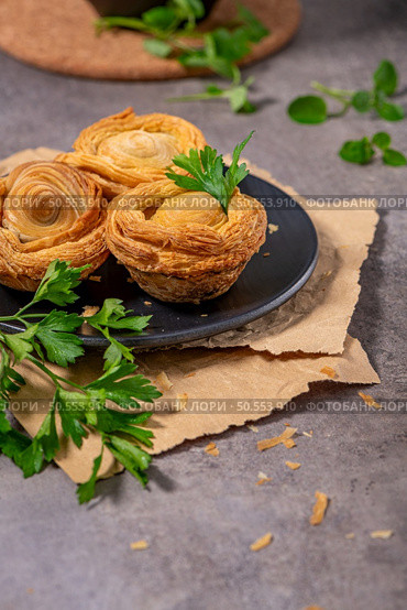 Pastries filled with meat, traditionally baked in black clay molds both from the region on Vila Real, Portugal. Стоковое фото, агентство Ingram Publishing / Фотобанк Лори