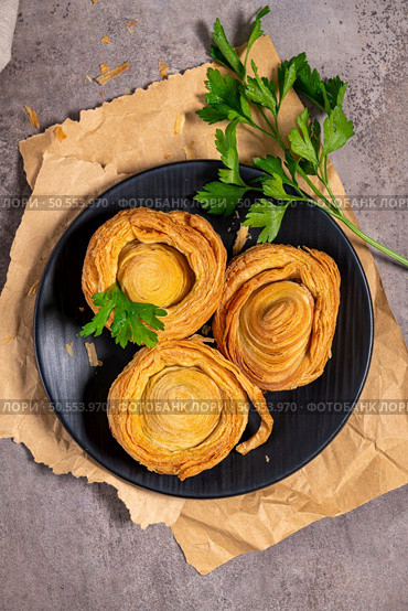 Pastries filled with meat, traditionally baked in black clay molds both from the region on Vila Real, Portugal. Стоковое фото, агентство Ingram Publishing / Фотобанк Лори