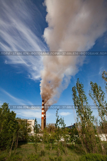 Pavlodar thermal electric station. Smoke stacks with white smoke. Стоковое фото, фотограф Alexey Rezvykh / Фотобанк Лори