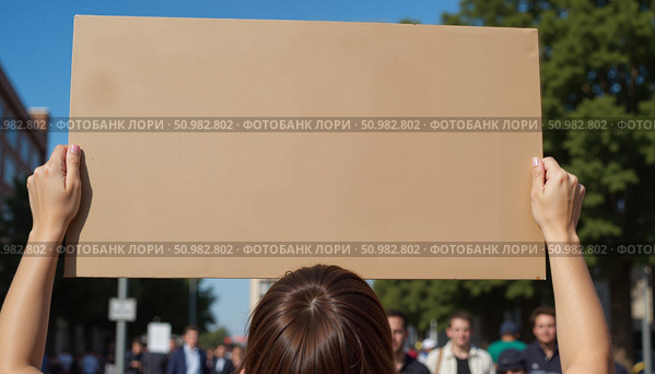 Person holding blank protest sign in city street during rally / Человек, держащий знак протеста на улице города во время митинга. Стоковое AI-изображение, AI-художник DeFusum / Фотобанк Лори