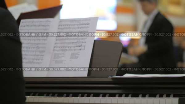Piano accompanist and choir director (2017 год). Редакционное видео, видеограф Данил Руденко / Фотобанк Лори