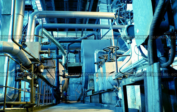 Pipes, tubes, machinery and steam turbine at a power plant           . Стоковое фото, агентство Ingram Publishing / Фотобанк Лори