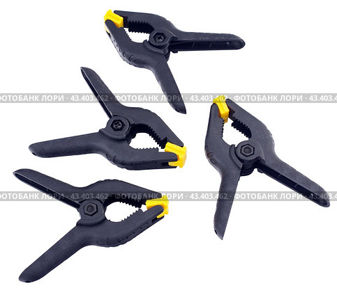 Пластмассовые зажимы на белом фоне. C clamps on white background. Стоковое фото, фотограф Татьяна Д / Фотобанк Лори