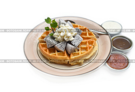 Plate of Belgium waffles with sliced dragon fruit and ice cream isolated on white background. Стоковое фото, фотограф Татьяна Терехина / Фотобанк Лори